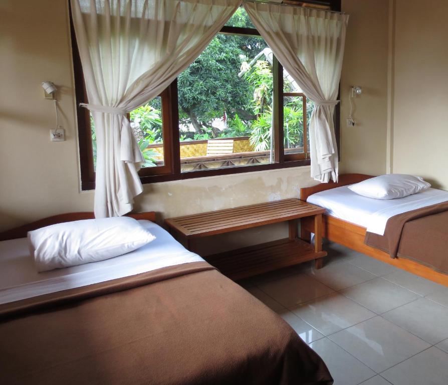 Paradise Palm Beach Bungalows And Dive Center Tulamben Chambre photo